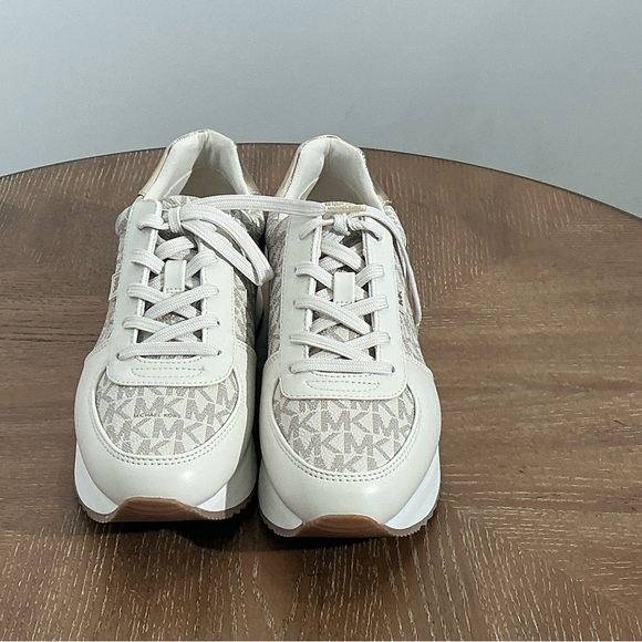 MICHAEL MICHAEL KORS
Raina Signature Logo Platform Trainer - Picture 2 of 4